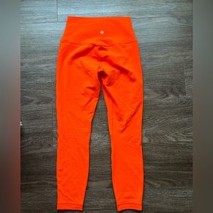 Like new orange lululemon leggings size 6